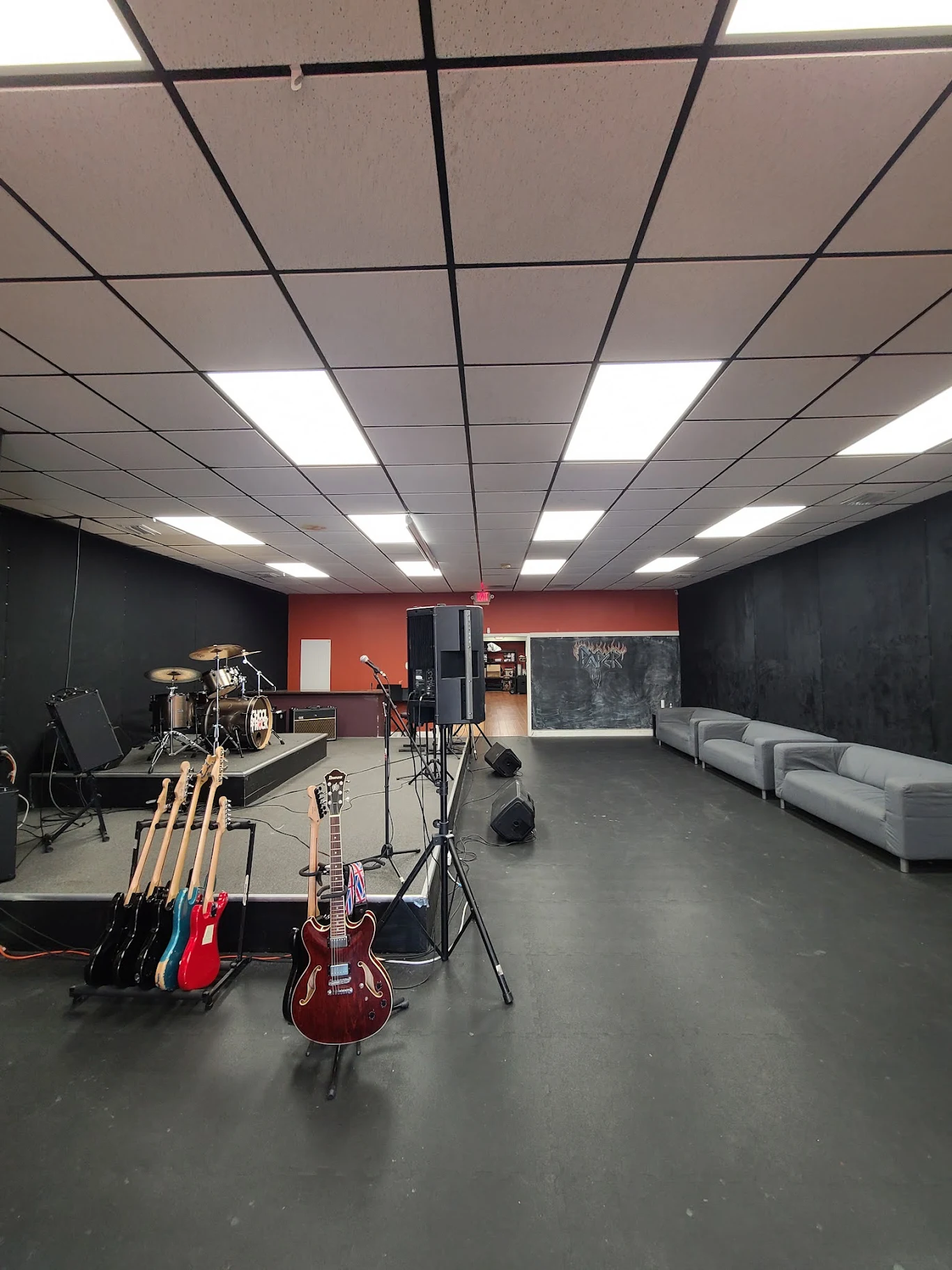 Commercial space with LED troffer lighting across a drop ceiling